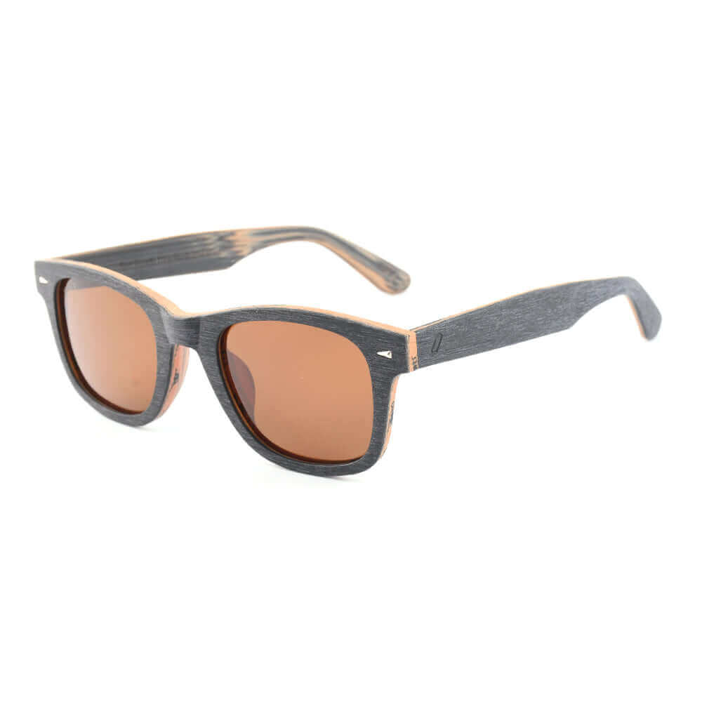 Sunglasses with wooden frame and brown lenses on a white background
