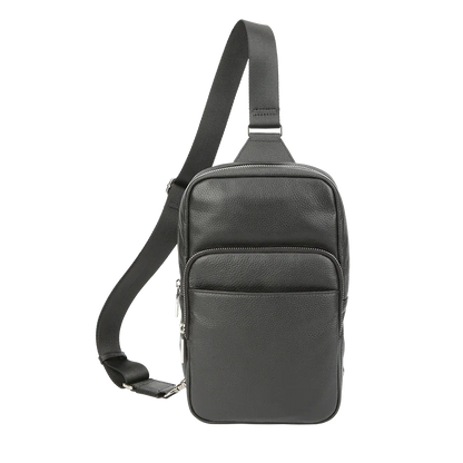 Gray leather sling bag on a white background