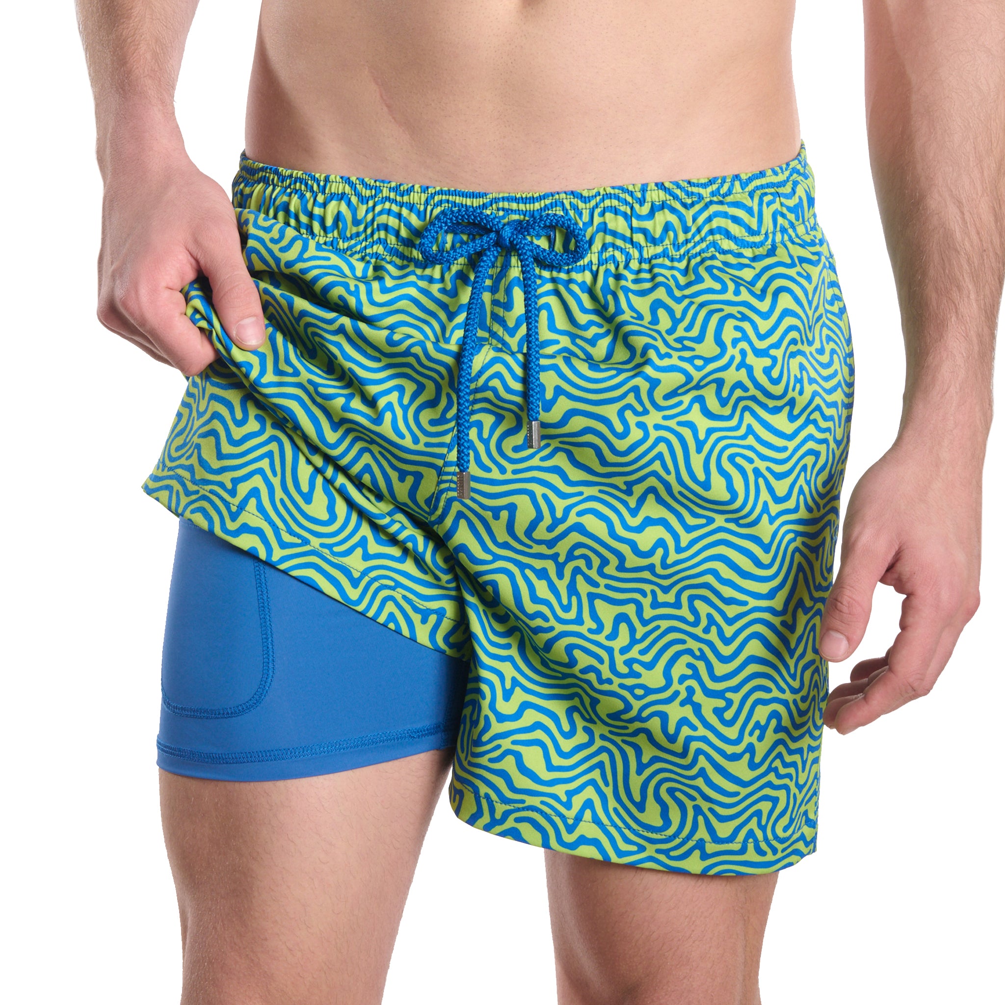 Man in Deco Maze Key Lime hybrid swim shorts, a lime and blue swirled maze print