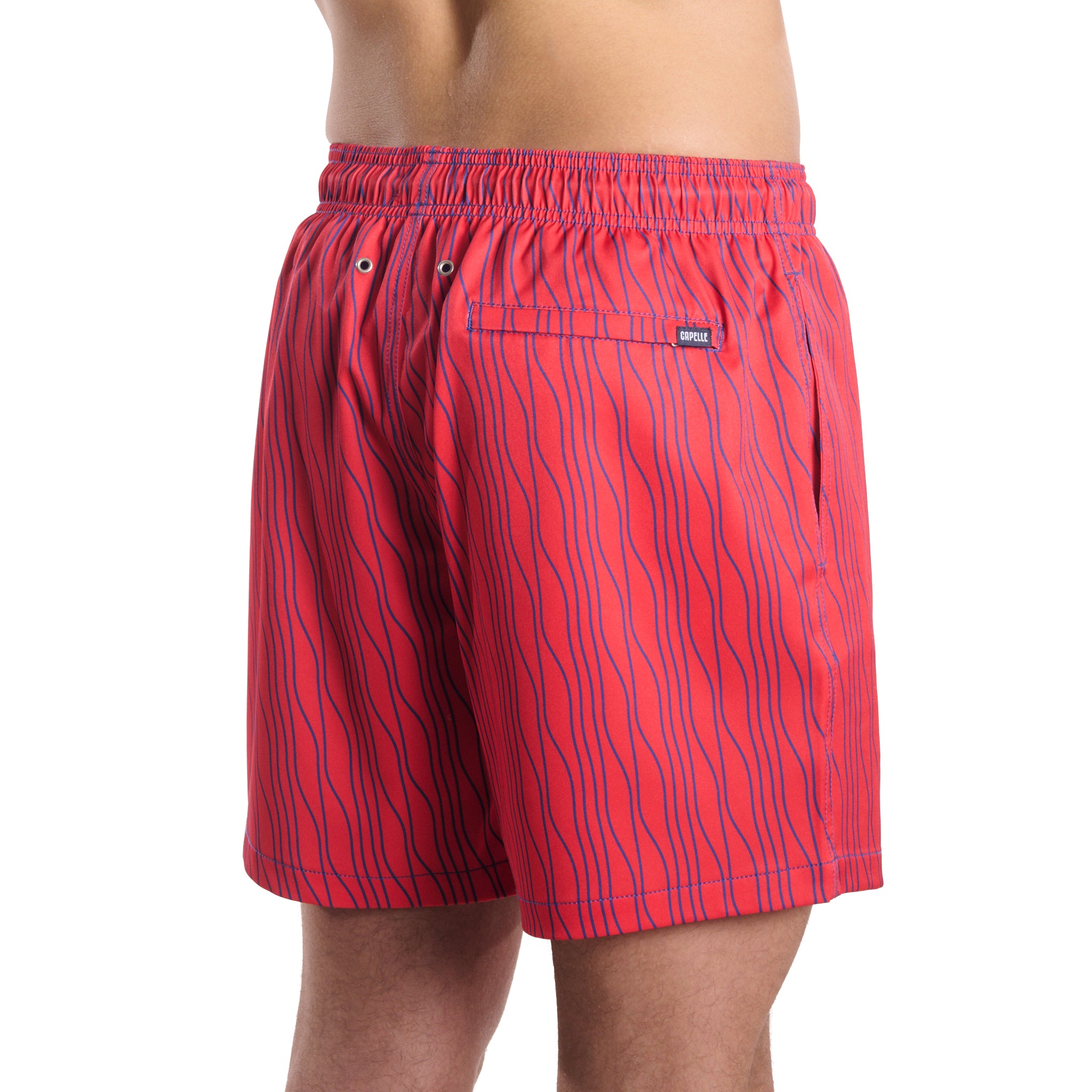 Linear Drift, Blaze and Harbor men's hybrid swim short in a blue and orange wave stripe, back view