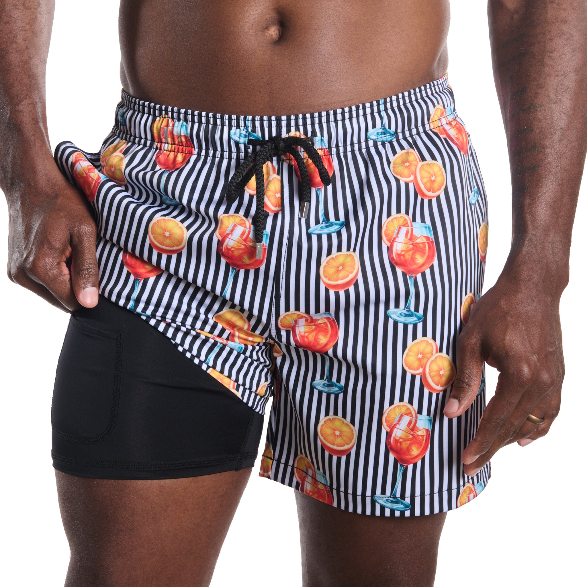 Sunset Spritz, Surf and Storm men's hybrid swim short, black and white stripe with a spritz cocktail print, front view showing the compression liner