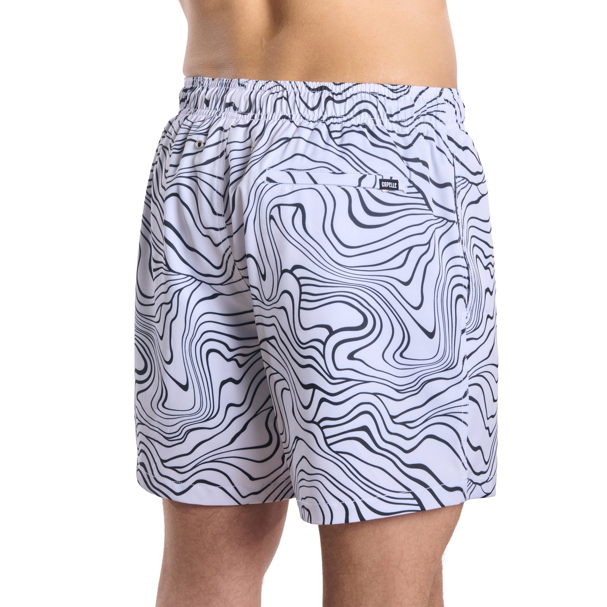 Sand Waves, Surf and Storm men's hybrid swim short in a black and white wave line print, back view