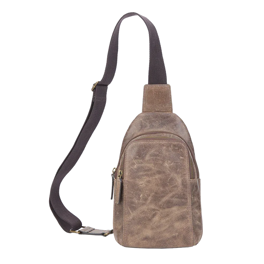 Brown suede crossbody bag with a strap on a white background
