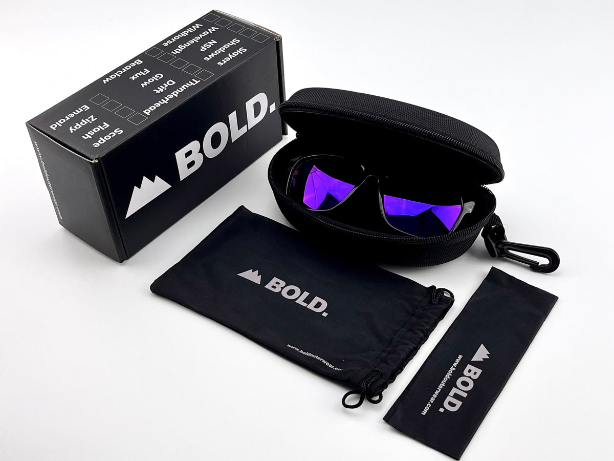 BOLD Thunderhead square sunglasses in purple with the BOLD box, zip case and cleaning pouch