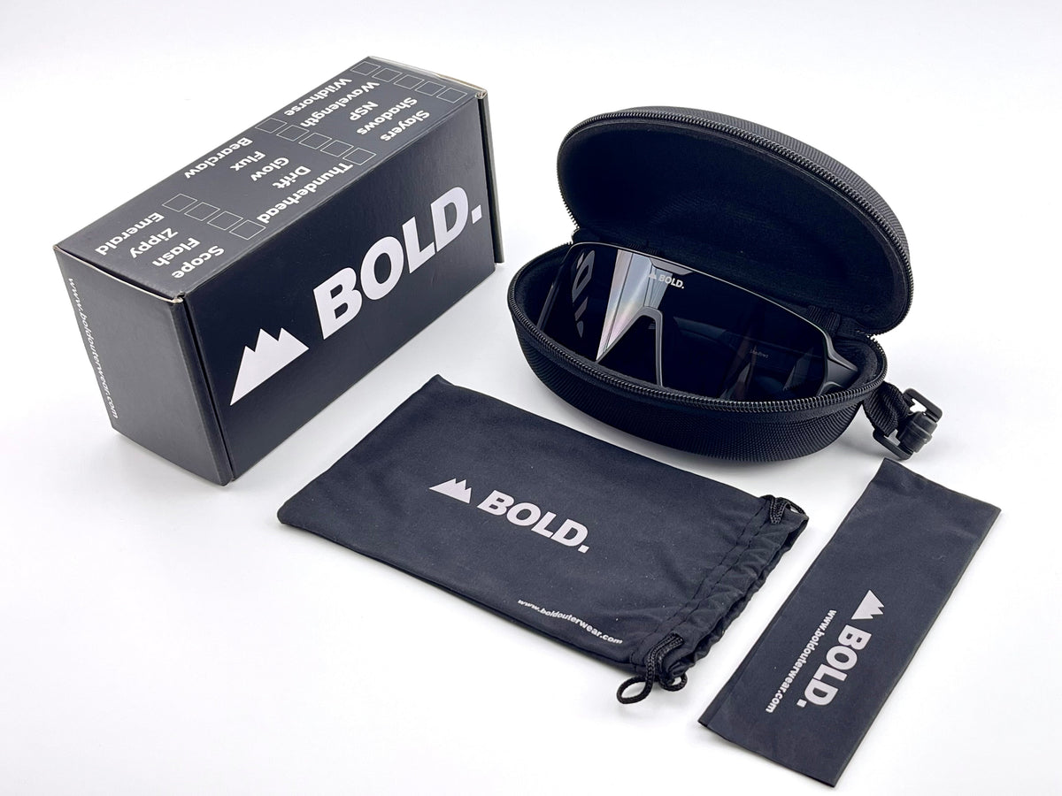 BOLD Shadows wrap sunglasses in black with the BOLD box, zip case and cleaning pouch