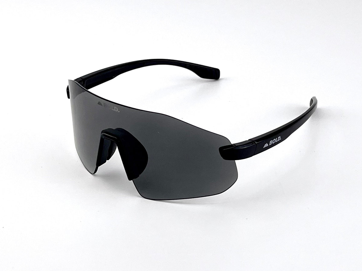 BOLD Emerald rimless photochromic sunglasses in black, view 1