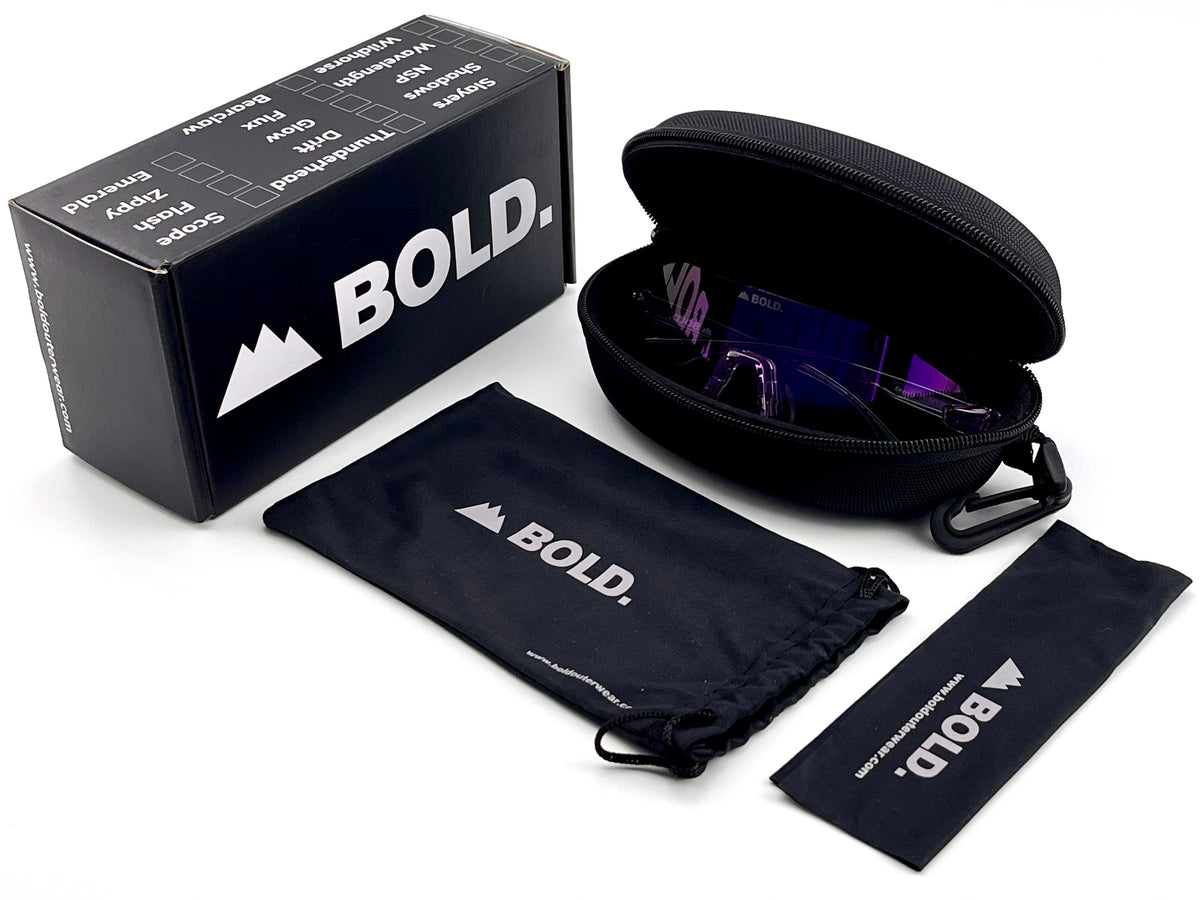 BOLD Emerald rimless photochromic sunglasses in purple with the BOLD box, zip case and cleaning pouch