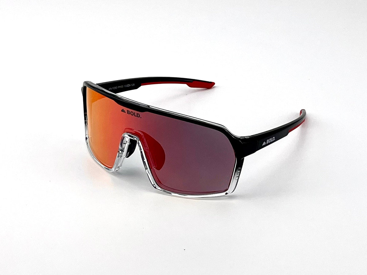 Sunglasses with black frame and red-tinted lenses on a white background