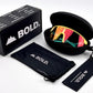 BOLD Flash photochromic sunglasses in blue and yellow with the BOLD box, zip case and cleaning pouch