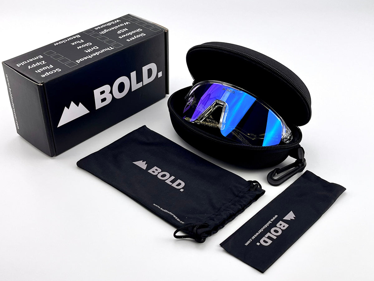 BOLD Flash photochromic sunglasses in white with the BOLD box, zip case and cleaning pouch