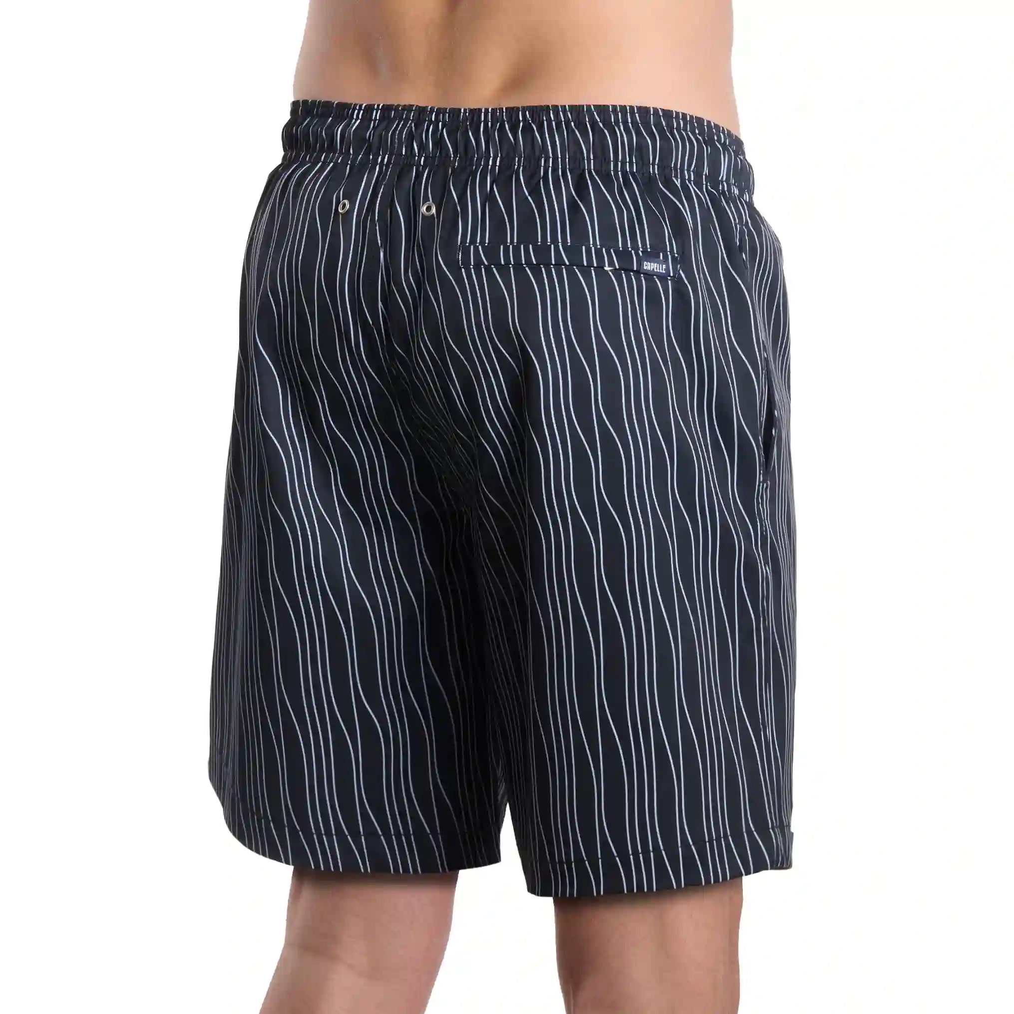 Linear Drift, Storm and Fog men's hybrid swim short in the 9 inch Long, charcoal with a white wave stripe, back view