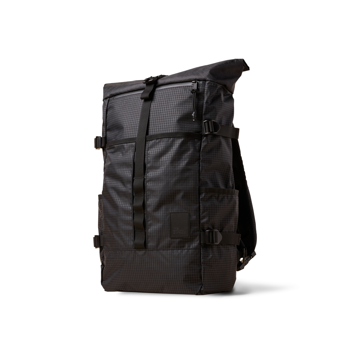 The Brown Buffalo Rolltop roll top backpack in Black Grid