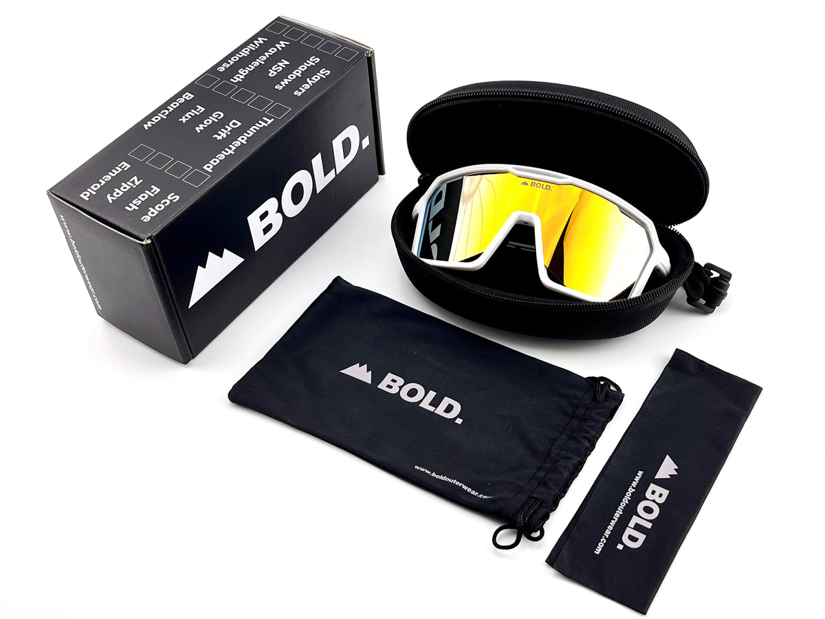 BOLD Flux wrap sunglasses in white with the BOLD box, zip case and cleaning pouch