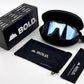 BOLD Flux wrap sunglasses in blue with the BOLD box, zip case and cleaning pouch