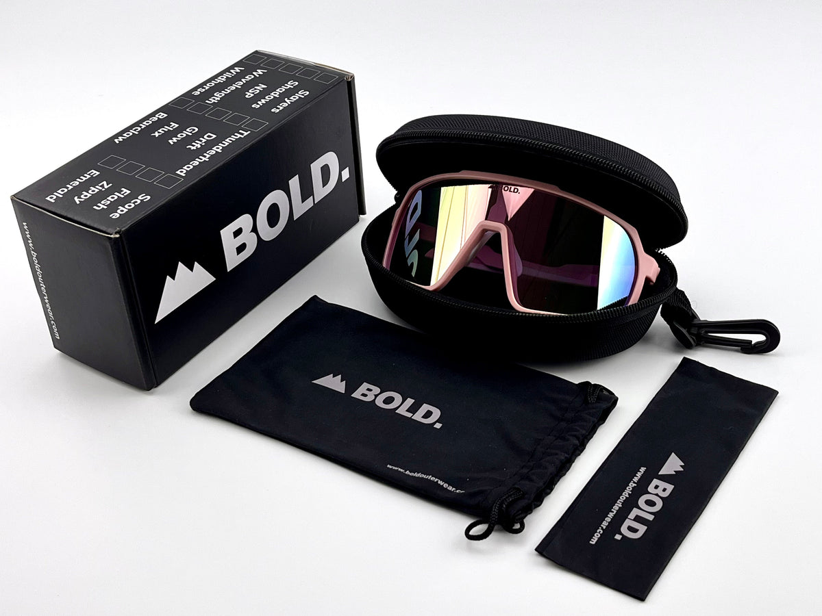 BOLD Slayers oversized sunglasses in pink with the BOLD box, zip case and cleaning pouch