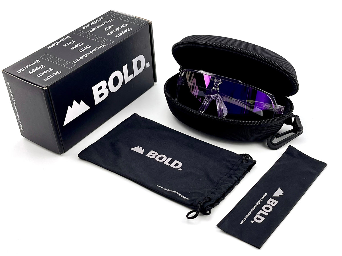 BOLD Slayers oversized photochromic sunglasses in purple with the BOLD box, zip case and cleaning pouch