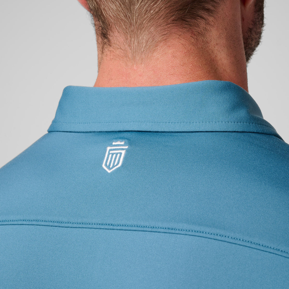 Greatness Wins Athletic Tech Polo in Aegean Blue, view 2