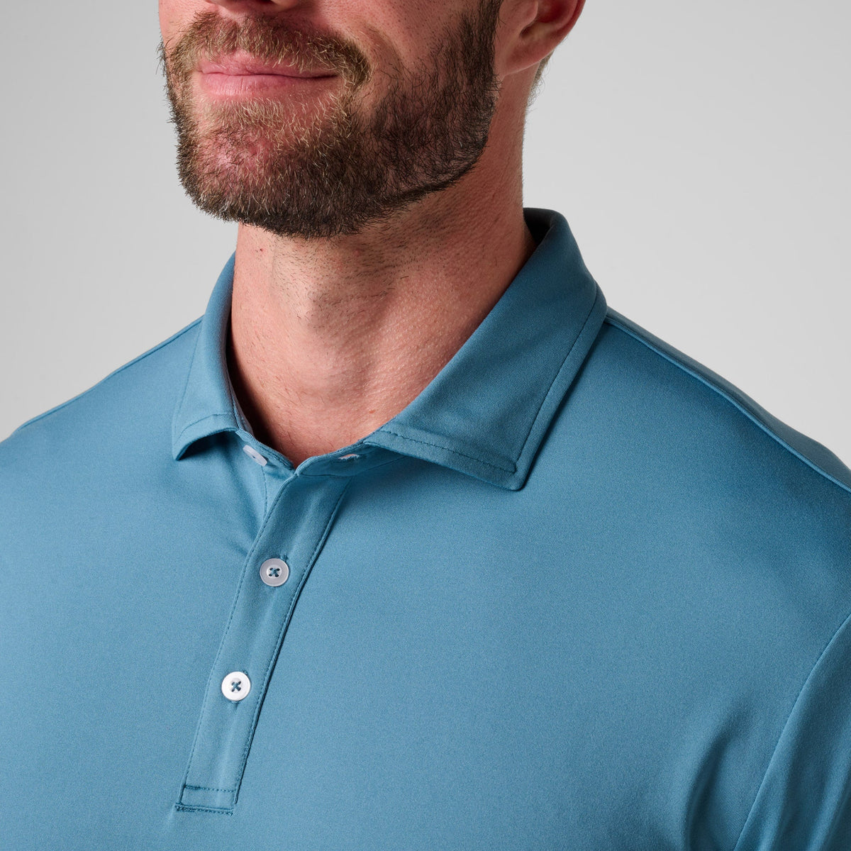 Greatness Wins Athletic Tech Polo in Aegean Blue, view 3