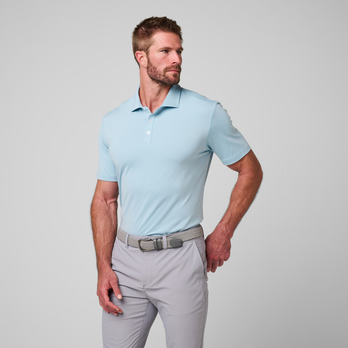 Greatness Wins Athletic Tech Polo in Coastal Blue