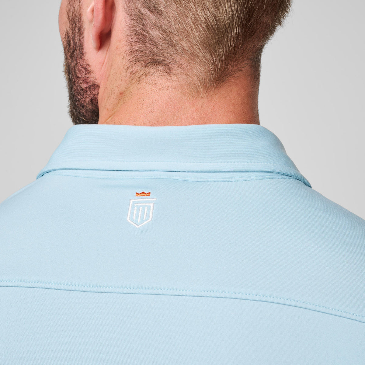 Greatness Wins Athletic Tech Polo in Coastal Blue, view 6