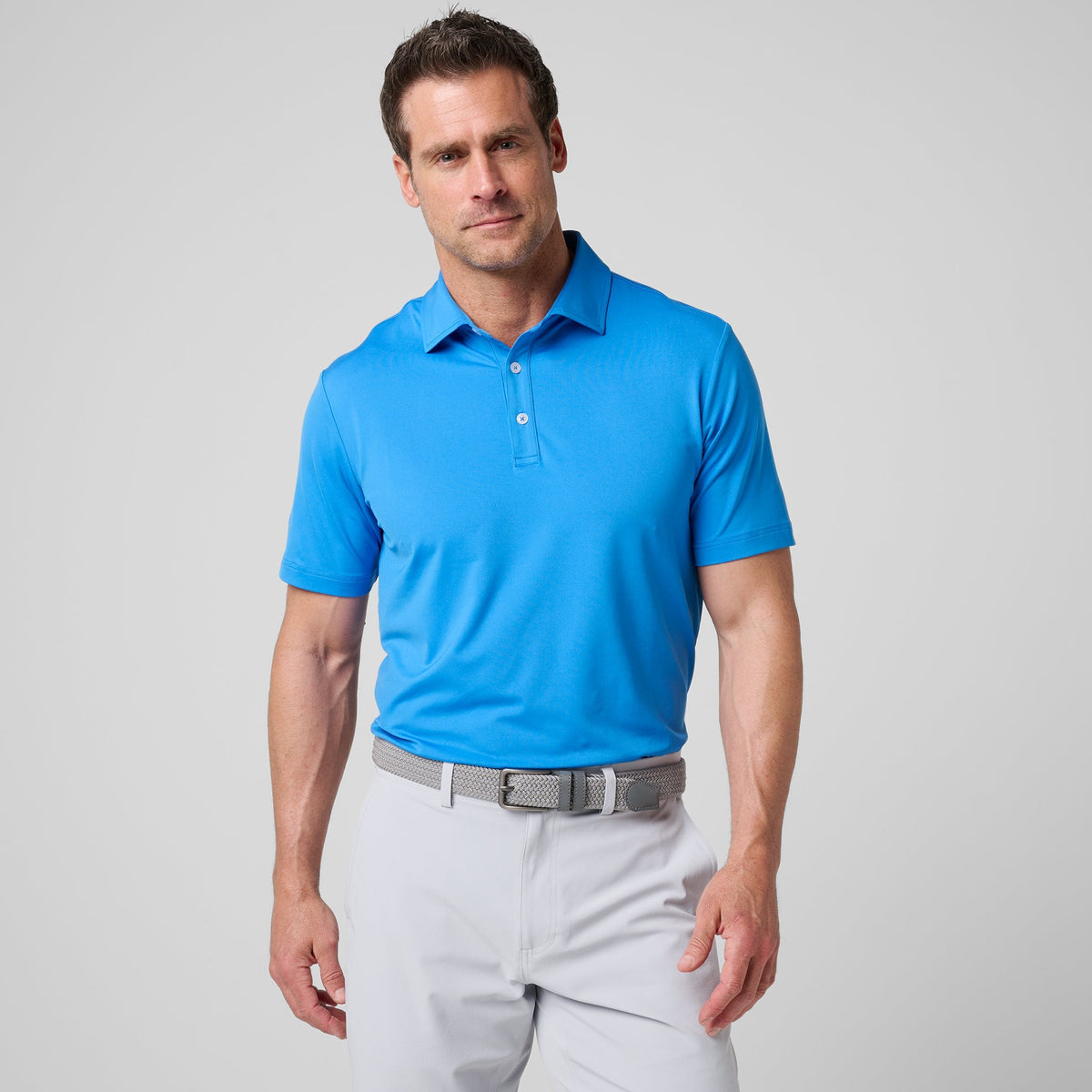 Greatness Wins Athletic Tech Polo in Sonic Blue