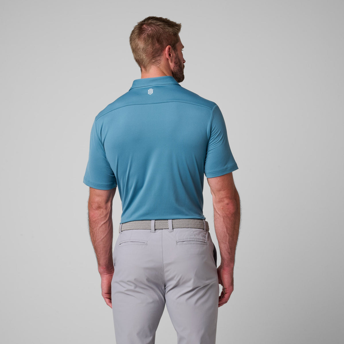 Greatness Wins Athletic Tech Polo in Aegean Blue, view 4
