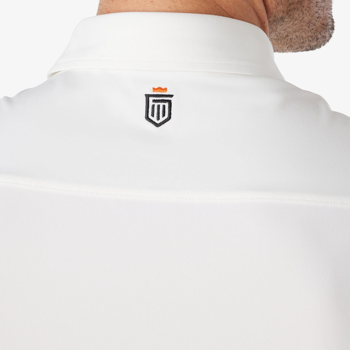 Greatness Wins Athletic Tech Polo in White, view 7