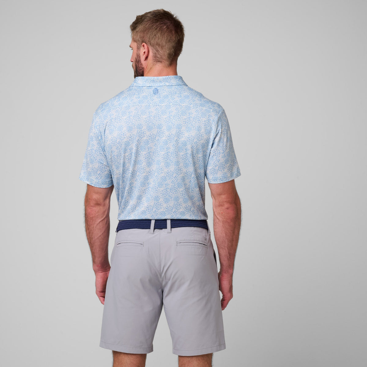 Greatness Wins Athletic Tech Printed Polo in White Blue Ditsy, view 3