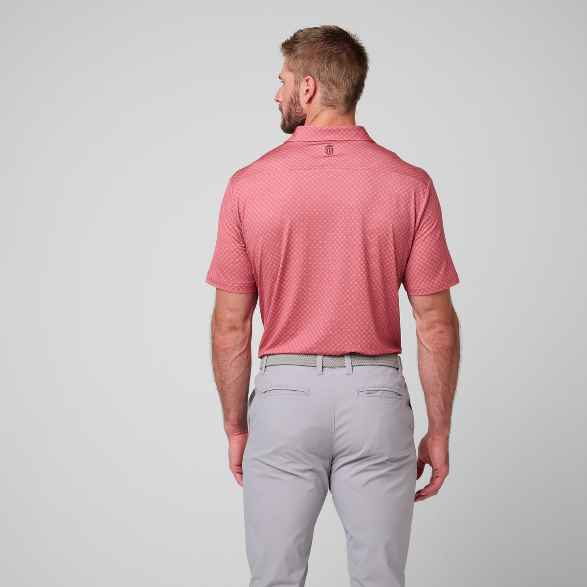 Greatness Wins Athletic Tech Printed Polo in Faded Red Geo, view 3