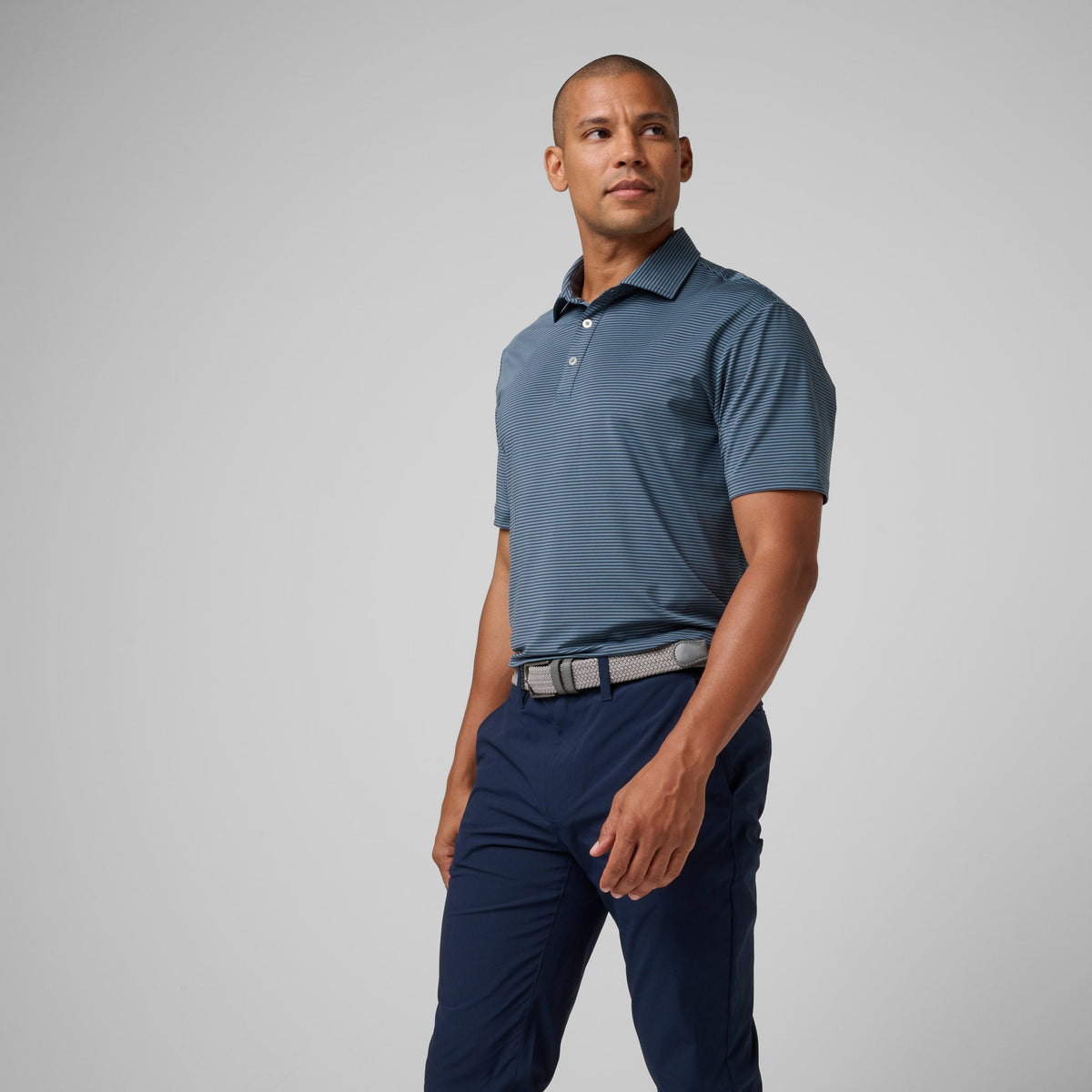 Greatness Wins Athletic Tech Stripe Polo in Storm Blue and Blue Atoll