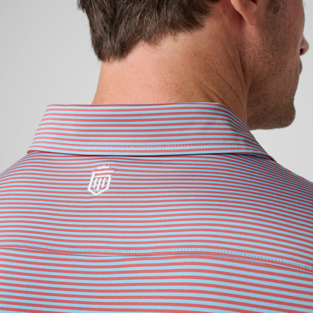 Greatness Wins Athletic Tech Stripe Polo in Faded Red and Carolina Blue, view 6
