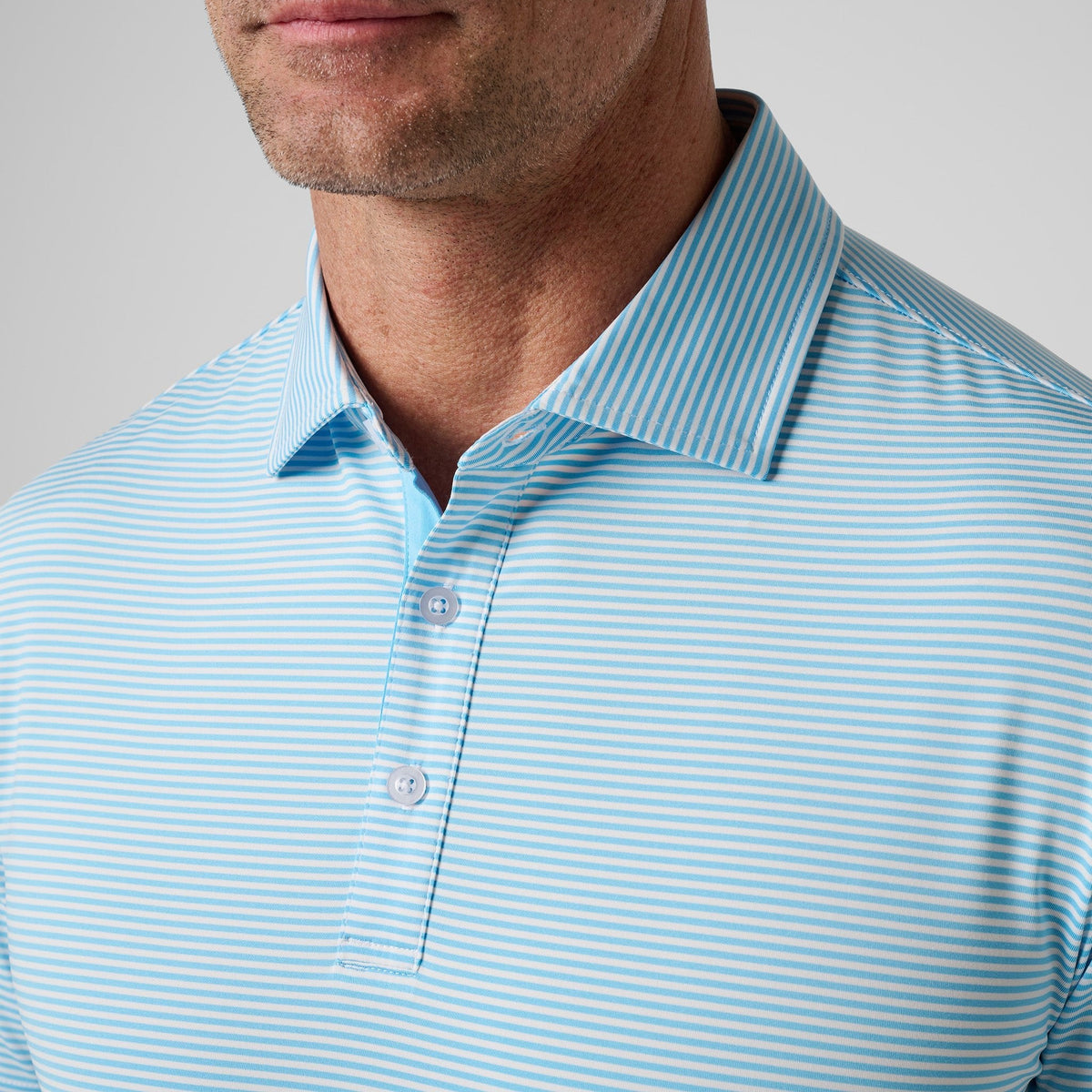 Greatness Wins Athletic Tech Stripe Polo in Carolina Blue and White, view 2