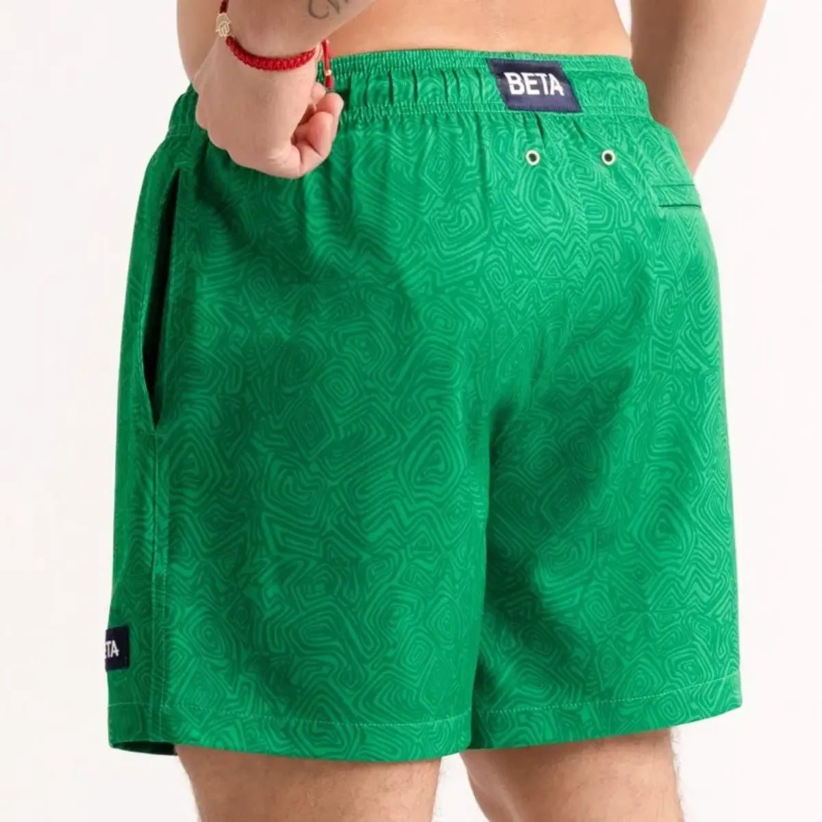 Beta Green men's hybrid swim short in solid green, back view