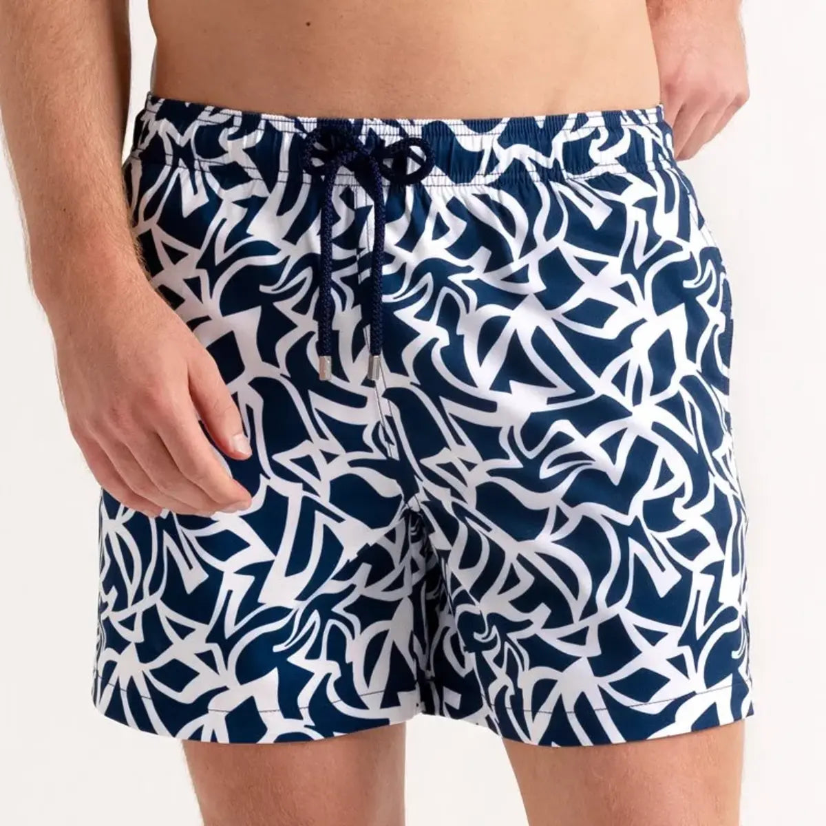 Blue Freedom men's hybrid swim short in a navy and white abstract floral print, front view, second angle