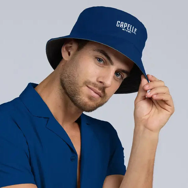 Blue and Green Reversible Bucket Hat worn blue side out, Capelle Miami