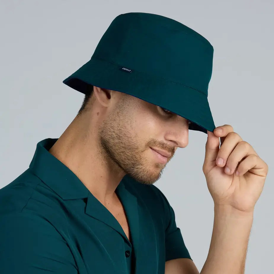Blue and Green Reversible Bucket Hat worn green side out, Capelle Miami