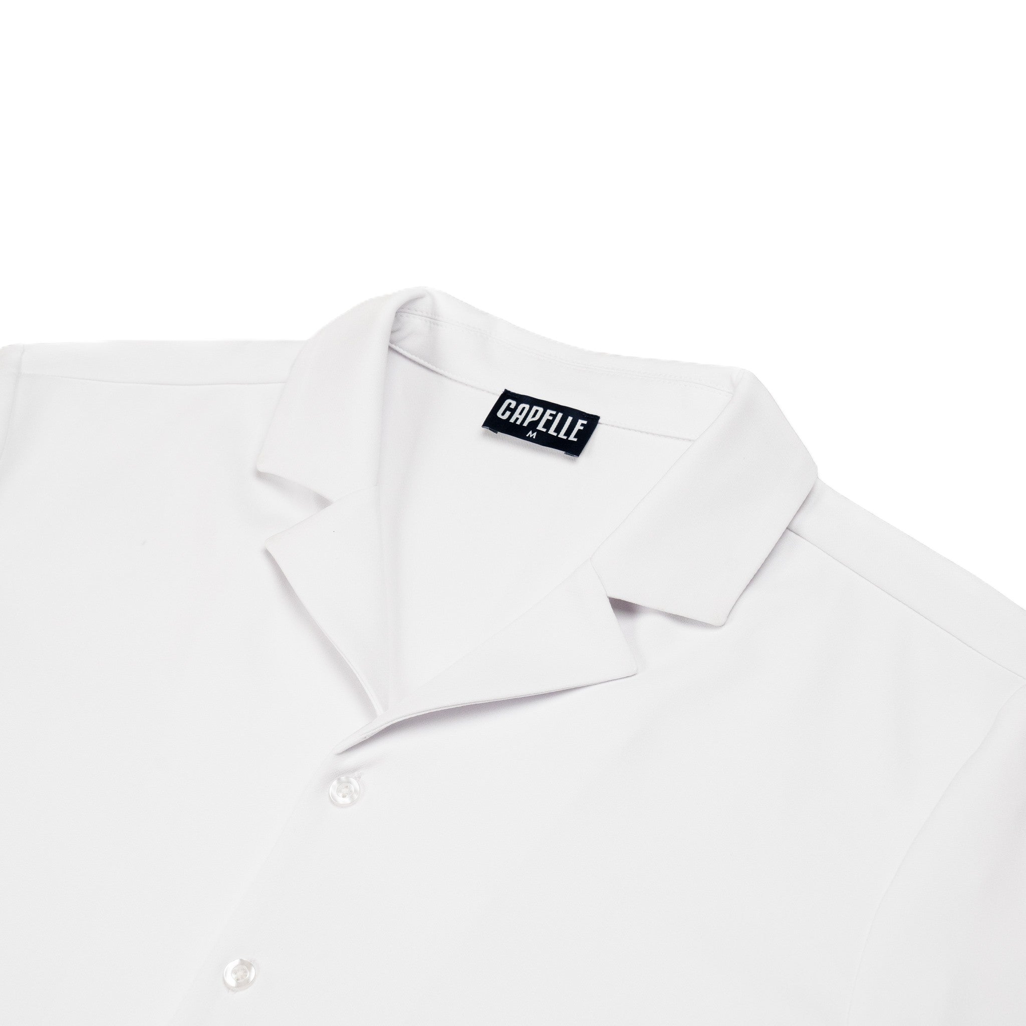 Close-up of the Arctic White resort shirt fabric and button placket in white