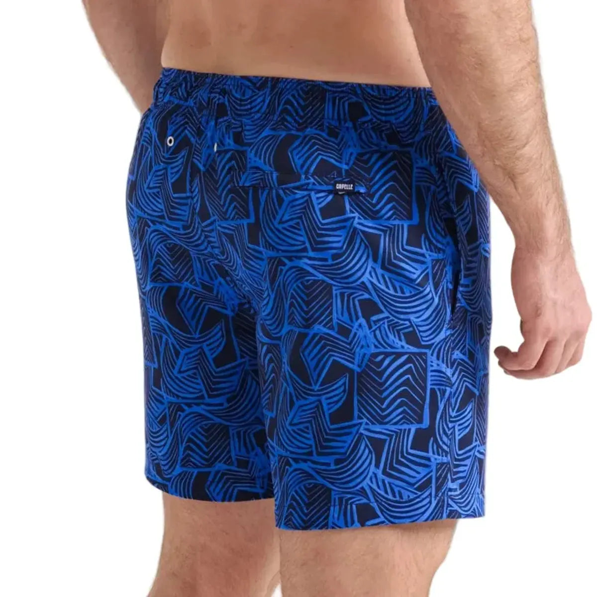 Enigma men's hybrid swim short in royal blue with a navy leaf outline print, back view
