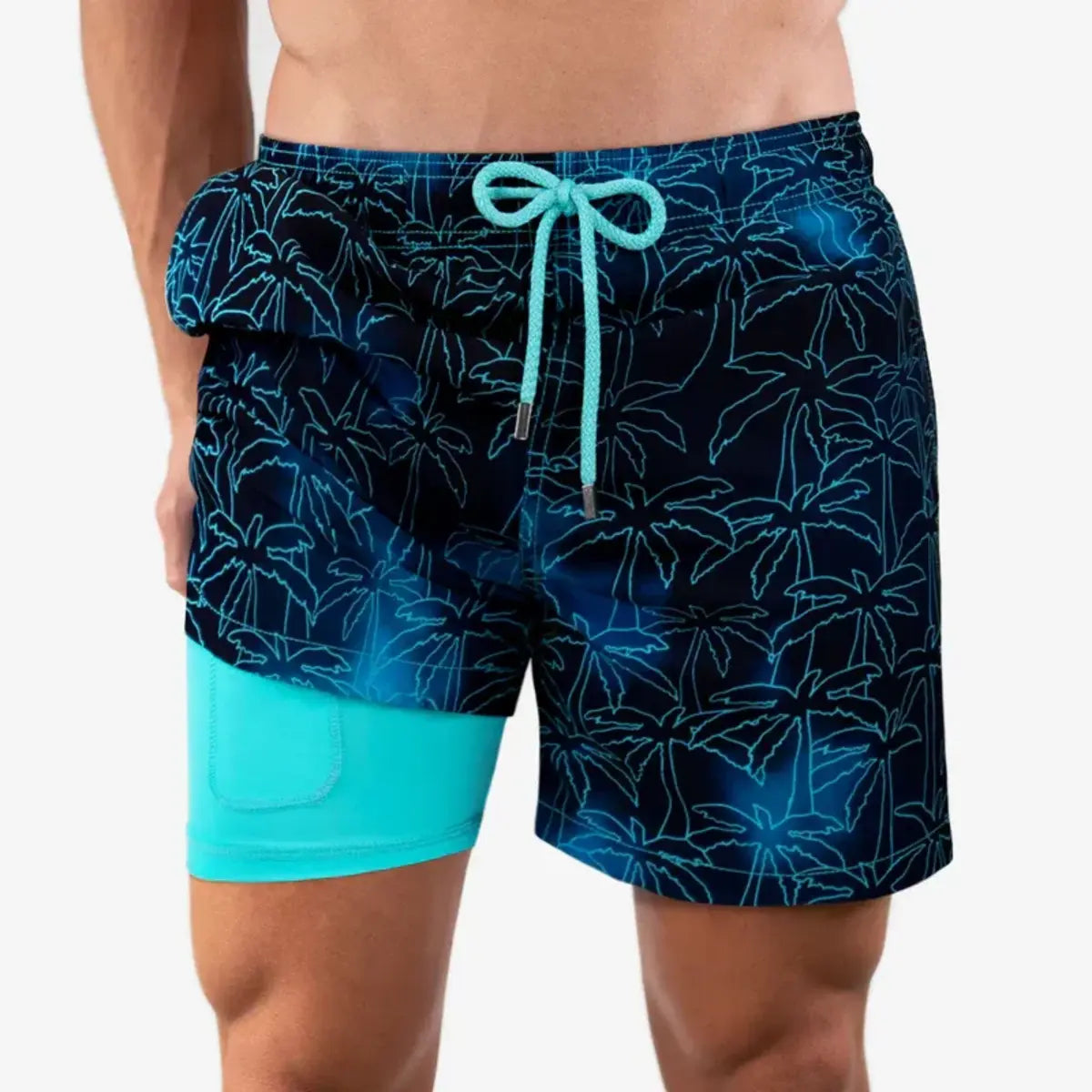 Foggy Palms men's hybrid swim short, navy with a turquoise outlined palm tree print and aqua drawstring, front view showing the aqua compression liner