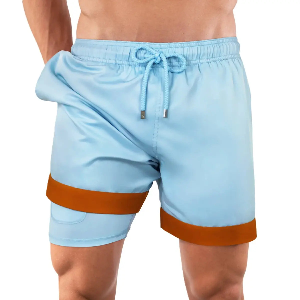 Ivo men's hybrid swim short in pale sky blue with a rust orange hem stripe, front view showing the pale blue compression liner