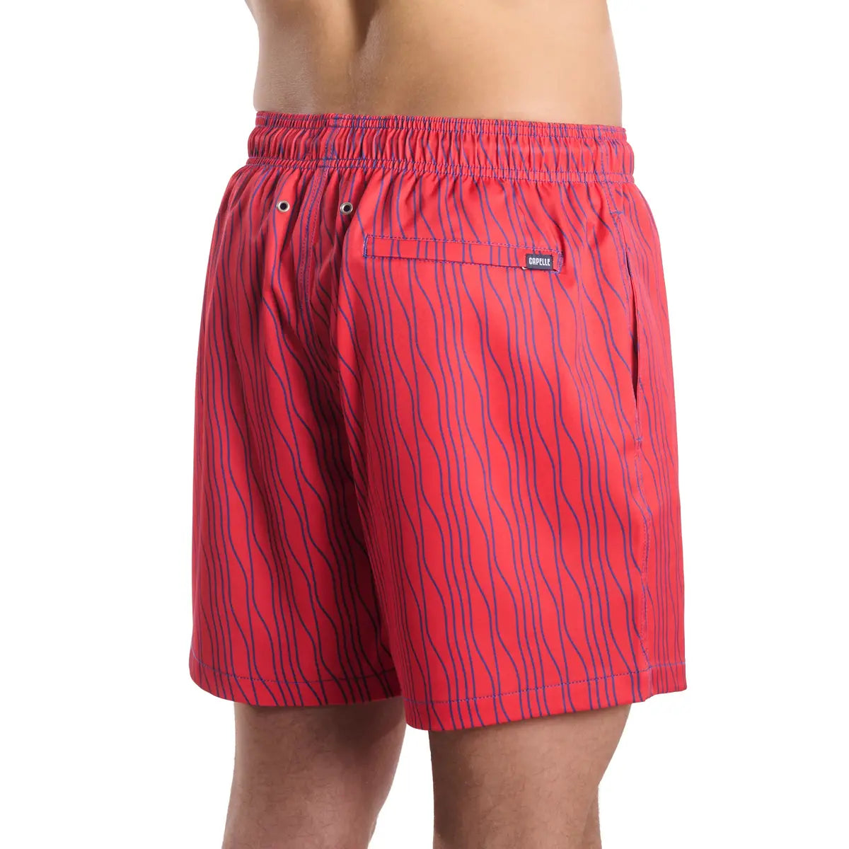 Linear Drift, Blaze and Harbor men's hybrid swim short in coral red with a blue wave stripe, back view