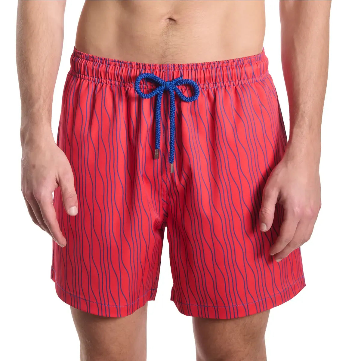 Linear Drift, Blaze and Harbor men's hybrid swim short in coral red with a blue wave stripe, front view, second angle