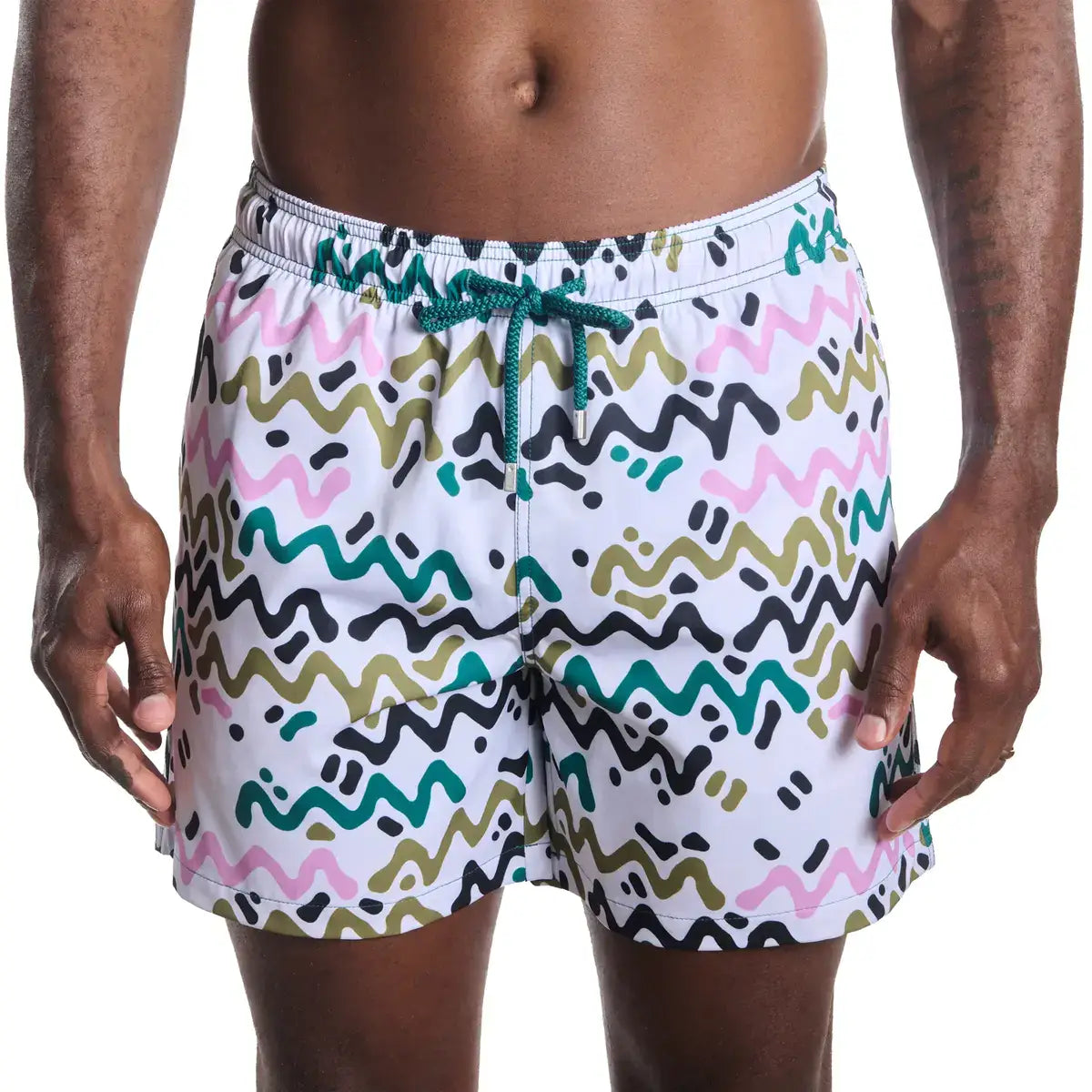 Line Rush, Orchid and Kelp men's hybrid swim short in a white, green, olive and pink zigzag print, front view, second angle