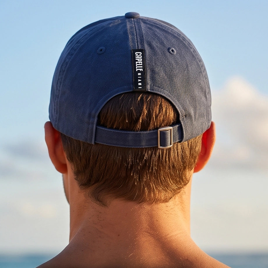 Navy Crew Unstructured Cotton Dad Hat from behind, navy fabric strap with tri-glide buckle, Capelle Miami