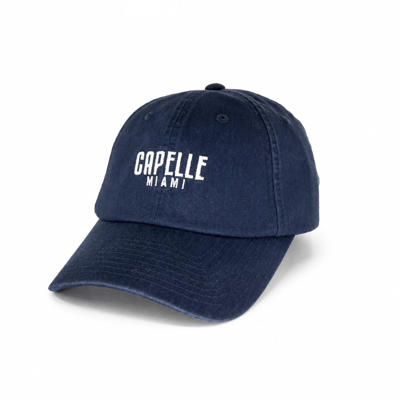 Navy Crew Unstructured Cotton Dad Hat, front, stone washed twill with flat satin embroidered Capelle Miami logo