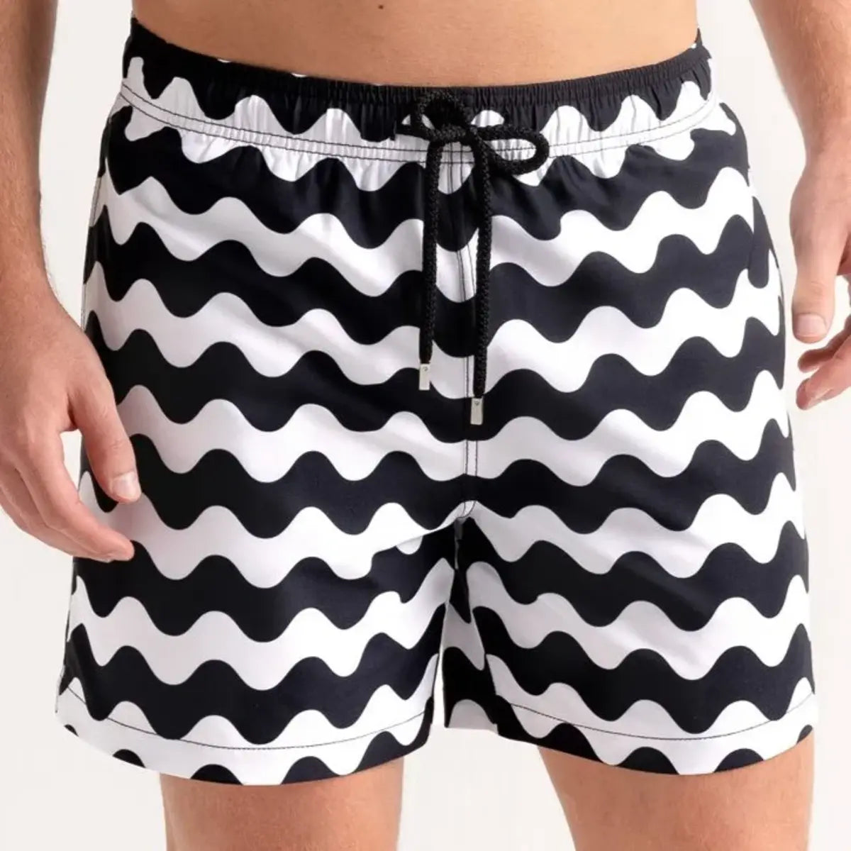 Pacific Waves men's hybrid swim short in a black and white wave chevron print, front view, second angle