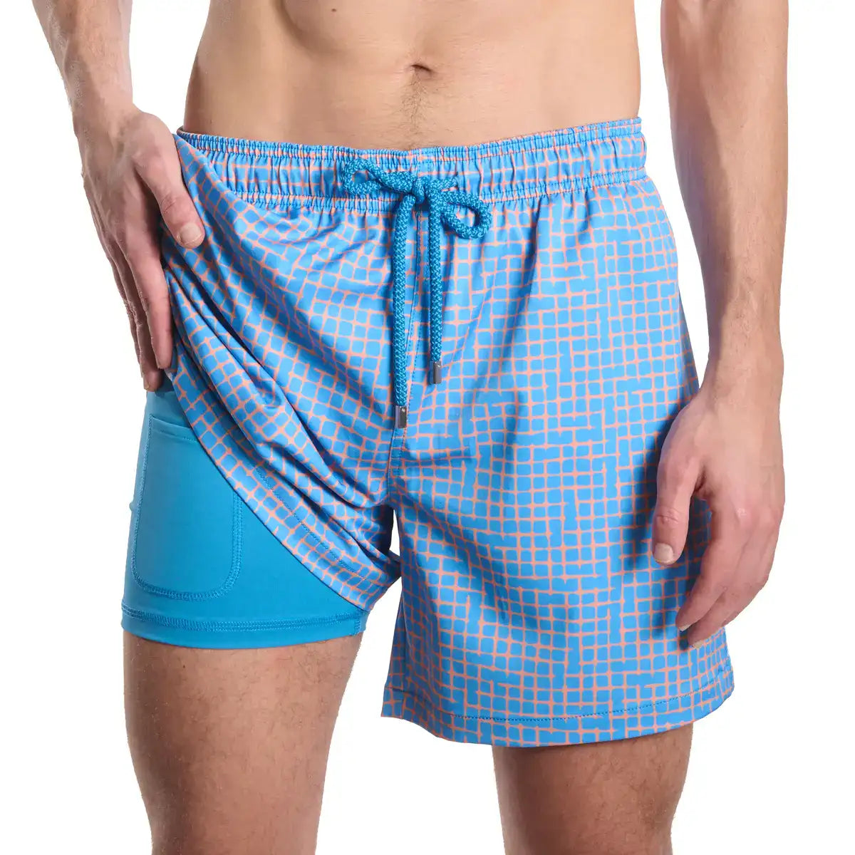 Pixel Break, Sunsplash men's hybrid swim short, sky blue with a coral and blue pixel grid check, front view showing the blue compression liner