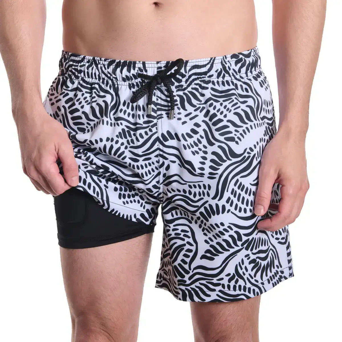Salt Spray, Surf and Storm men's hybrid swim short, black with a white coral reef print, front view showing the black compression liner