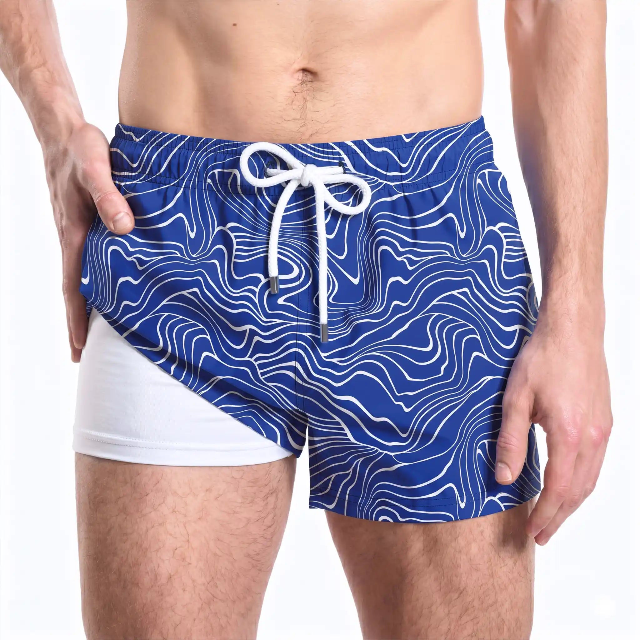 Sand Waves, Harbor and Surf hybrid swim short in the 3 inch Short, cobalt with a white wave line print, showing the built-in compression liner