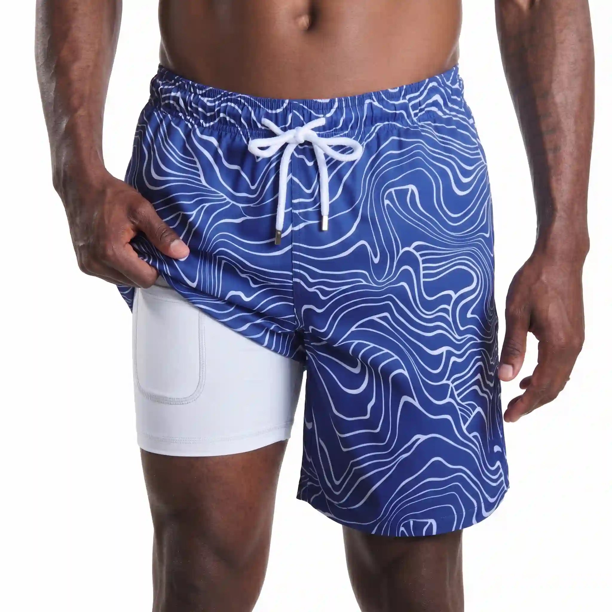 Sand Waves, Harbor and Surf hybrid swim short in the 9 inch Long, cobalt with a white wave line print, showing the built-in compression liner